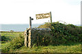 Footpath sign to St Nons Well in SA62 6BN