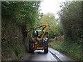 Hedge-trimming in progress, Rudry Rd, Cardiff in CF14 0SN
