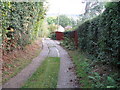 Footpath climbing away from Jack O'Toms Wood in RH17 7JL