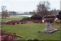 Garden ornament and gardens at  Powderham Castle, Devon in EX6 8JE