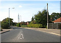 View south-west along Stoke Road in NR14 7UR