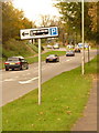 Shaftesbury: bus parking signpost (left-facing symbol) in SP7 8GB