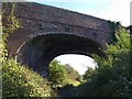 Bridge across former railway line, Ringwood in BH24 1EX
