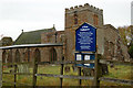 Entrance and sign, Church of St Peter, Wolfhampcote in CV23 8AR