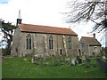 St Peter's church and adjoining school room in NR12 8BT