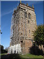 The scaffolded tower of St Mary's, Acton in CW5 6AD