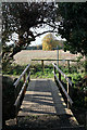 Footbridge with open countryside beyond in LN11 8NH