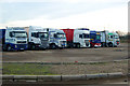 Lorries parked at the Stibbington Diner as dusk falls in PE8 6LP