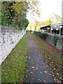Looking NW along the path to the church in SN6 6JY