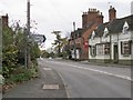 Junction of Warwick Road and Woodcote Lane, Leek Wootton in CV35 7RG