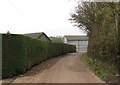 Driveway to farm buildings in IP22 2LP