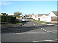 Looking from Greenfield Crescent into Marjoram Crescent in PO8 9BJ