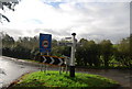 Signpost, junction of Powdermill Lane & Telham Lane in TN33 0SP
