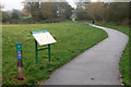 Signs beside the footpath in Newbold Comyn Park in CV31 1NT