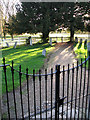 Path through the churchyard in NR14 8JU