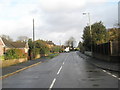 Looking northwards up Frogmore Lane from the junction of Bevan Road in PO8 9WN