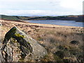 Boulder overlooking Loch Glassie in PH15 2JN