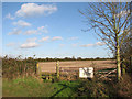 Stile and gate on public footpath east of Mulbarton in NR14 8JU