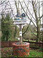 Starston village sign by the bridge over the Beck in IP20 9NL