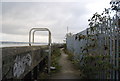 Riverside path along the flood wall in RM20 4BJ