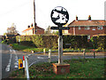 Surlingham village sign in NR14 7DA