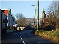 Road junction in Fettercairn in AB30 1XW