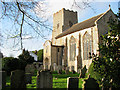 All Saints Church illuminated by low winter sunlight in Ashwellthorpe and Fundenhall