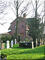All Saints Church - view across the churchyard in Ashwellthorpe and Fundenhall