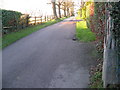 Footpath and road to Old House and Old House Farm in RH19 4RA