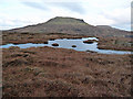 Frozen lochan on Beinn Bhac-ghlais in IV55 8ZB
