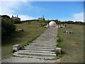 Steps leading to the stone globe at Durlston Castle in BH19 2HT