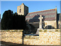 St Andrew's church and war memorial in PE33 9DN