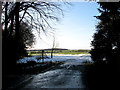 Icy footpath past St Mary's church in PE33 9NW