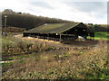 Cattleshed by dismantled railway in GU28 0PS