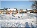 Looking from The Oaks over the playpark towards Chalton Crescent in PO9 3AA