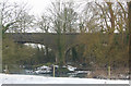 View across the River Leam to disused railway viaduct, Birdingbury in CV23 8ET
