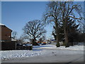 Looking from a snowy St Albans Road into Bartons Road in PO9 2LE