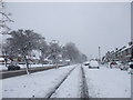 Llanedeyrn Rd, Cardiff, on a snowy day in CF23 9PJ