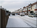 Approaching the junction of a snowy Dysart Avenue and Invergordon Avenue in PO6 2DS