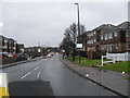 Looking down a rain sodden B2140 towards Angmering Station in BN16 3RH