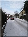A snowy pavement in East Cosham Road in PO6 2DS