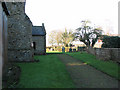 All Saints church - path through churchyard in IP26 5AD