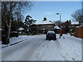 Looking along a snowy Tavistock Gardens towards Pook Lane in PO9 2RY