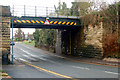 Looking west at the railway bridge over Rugby Road in CV34 6PX