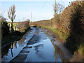 A wet Bank Road in TN25 7DE