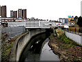 River Ravensbourne and Elverson Road DLR station in SE10 8PD