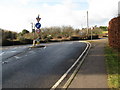 Tee junction with the A283 on the outskirts of Pulborough in RH20 2DT