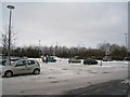 Car park with some snow in RG22 4HT