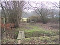 Footbridge and two stiles near Lamberden Wood in TN26 3EW
