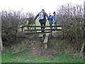 An uphill stile in NN17 3DZ